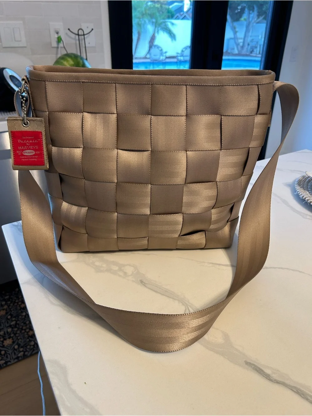 Harvey’s The Original Crossbody Shoulder Bag - Taupe. 13” x 11” x 4”